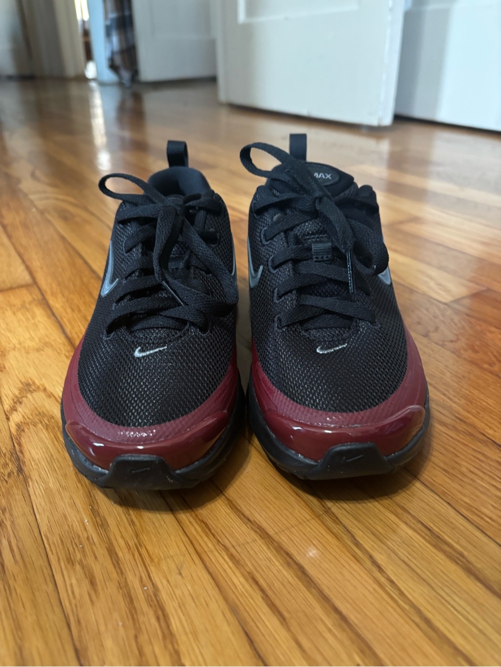 Nike Kids Black Sneakers with Burgundy Toe Trim
